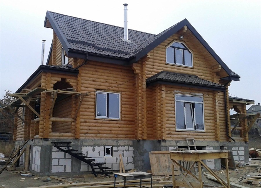 Огляд популярних проектів оциліндрованих будинків для родини